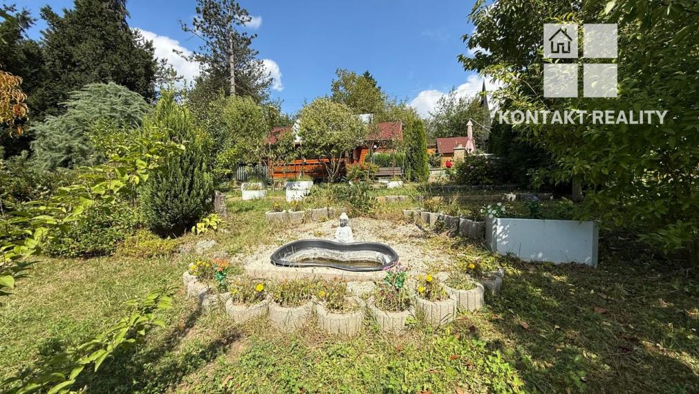 Záhrada a chatka blízko mesta, ul. Brusnicová, Ťahanovce